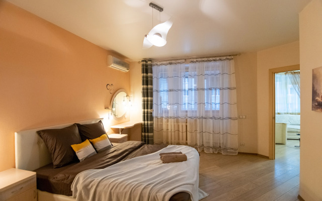V Tikhom Ukhozhennom Rayone Apartments
