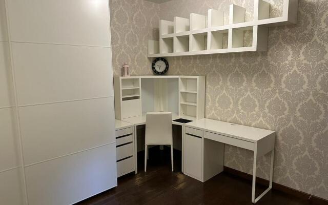 Na Panfilova 25 Flat