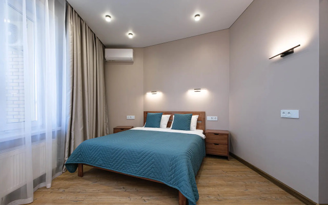 Квартира Новая студия в 5 минутах от ТРЦ Аура