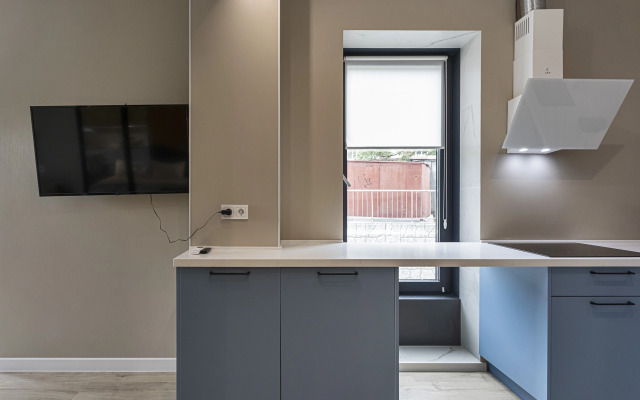 V Tsentre Goroda Apartments