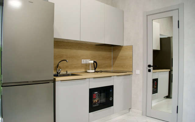 Cрetyrekhmestnye S Kukhney Apartments