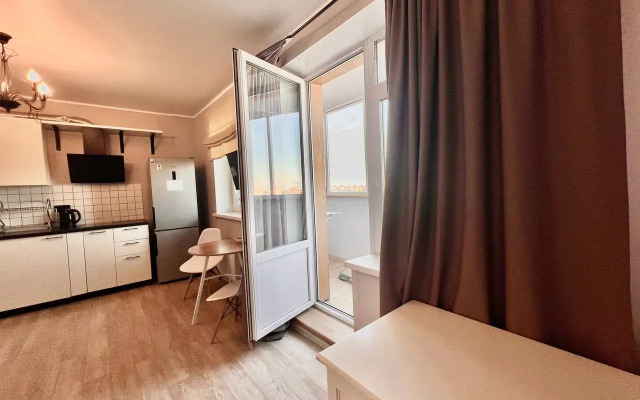 Квартира Уютная студия на Геологоразведчиков 44А