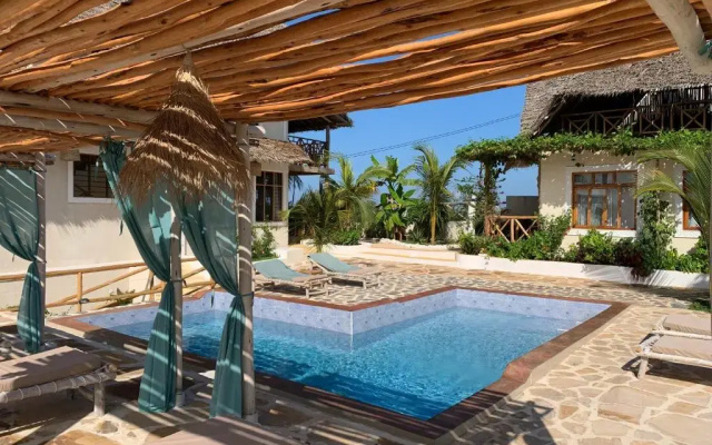 Отель Zanzibar Tropical Sunset Boutique Hotel - Adults Only