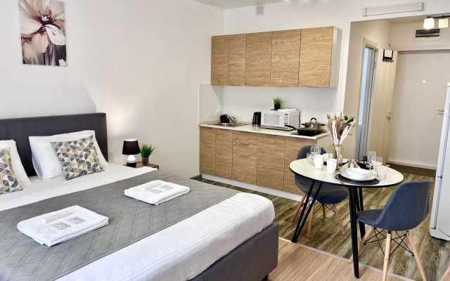 Квартира Комфортная Новая Студия с Мягкой Кроватью