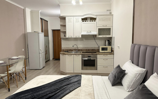 Квартира Уютная и современная студия на Родонитовой 35