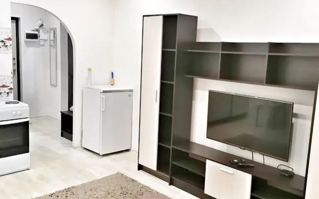 Квартира Уютная студия рядом с ТРЦ АУРА