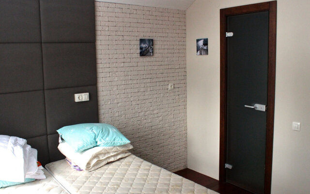 Kottedzh V Sosnovom Lesu Guest house