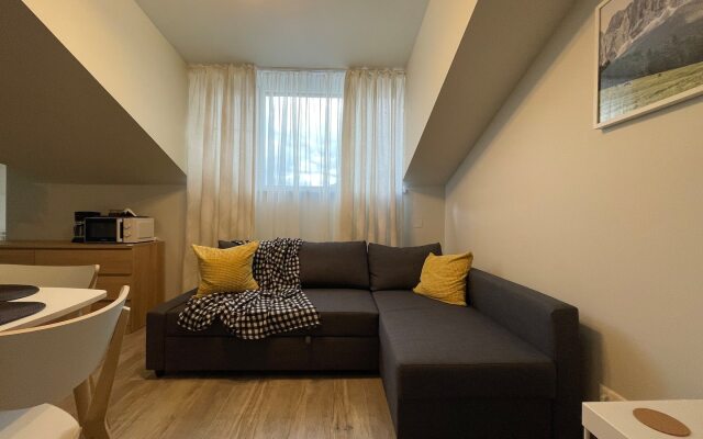 Апартаменты в Окружении Гор и Озера