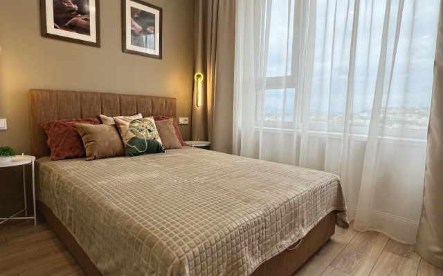 TopHouse na Strelkovoy 18k2 Apartments