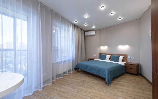 Квартира Новая студия в 5 минутах от ТРЦ Аура