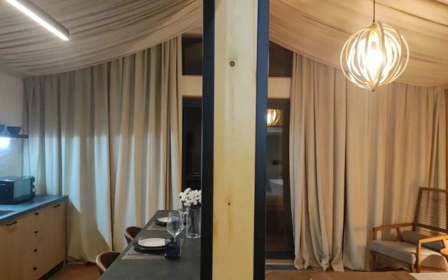 Коттедж Экоранчо Лодж-студия с панорамной ванной и сауной