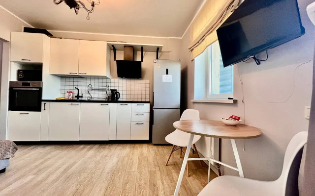 Квартира Уютная студия на Геологоразведчиков 44А