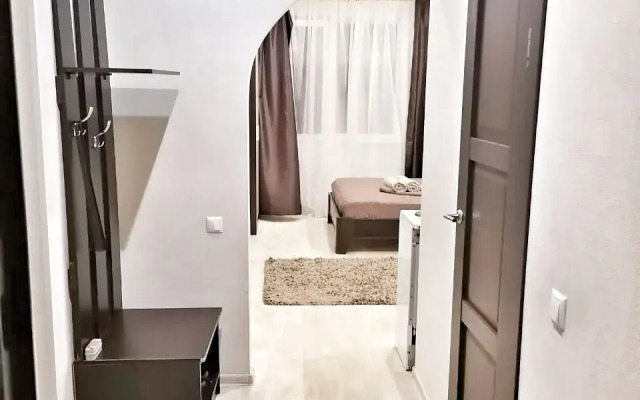 Квартира Уютная студия рядом с ТРЦ АУРА