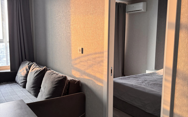 Квартира Уютная двухкомнатная студия у Аквапарка