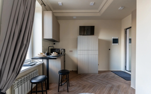 Апартаменты Стильная и уютная студия в центре