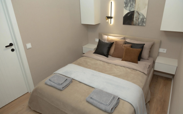 V Tsentre Goroda Flat
