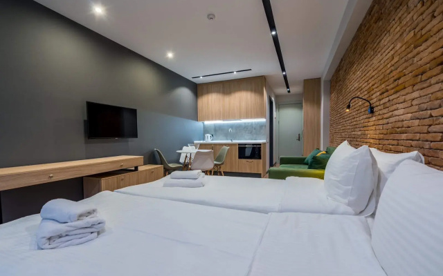 Апарт-отель New Gudauri Atrium Modern Apartments with Ski in/out