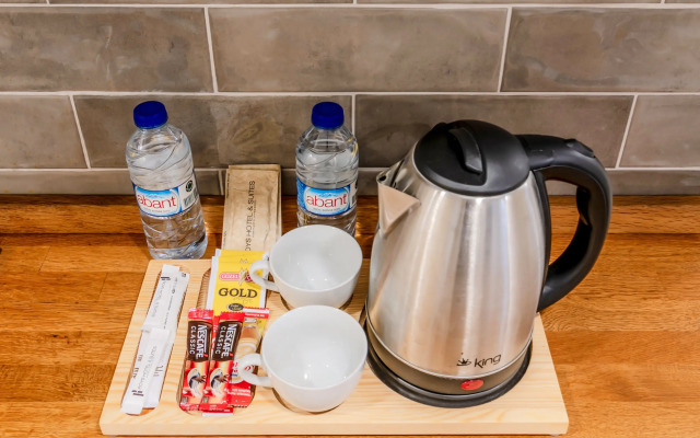 Отель Roys Hotel & Suites