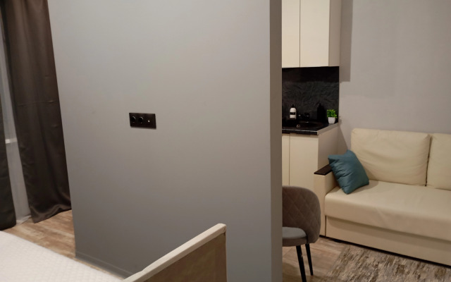 Квартира Уютная студия в рядом с ДРКБ