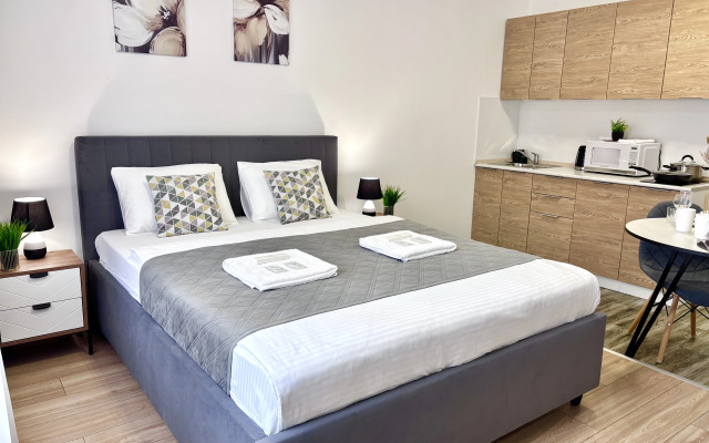 Квартира Комфортная Новая Студия с Мягкой Кроватью