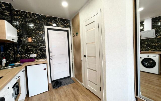 V Tsentre Goroda Apartments