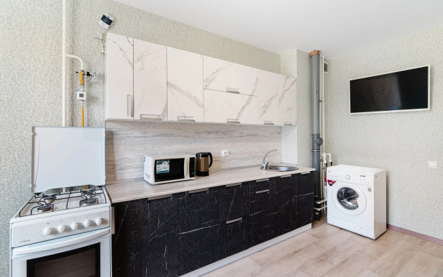 V Novom Dome Flat