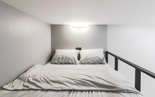 Квартира Уютная двухъярусная студия в центре