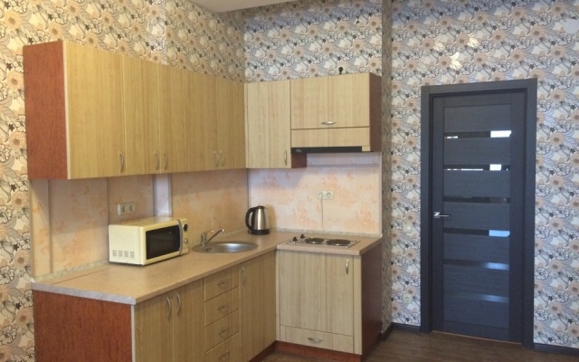 V Tsentre Goroda Apartments