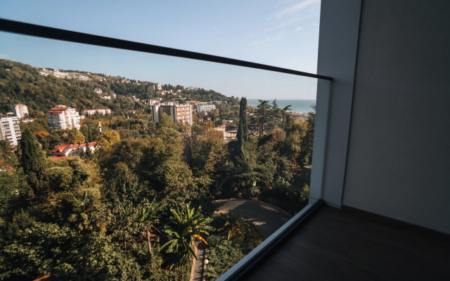 V Sochi Tsentr  Khosty s kruglogodichnym podogrevaemym bassejnom i vidom na more AK Gorka Apartments