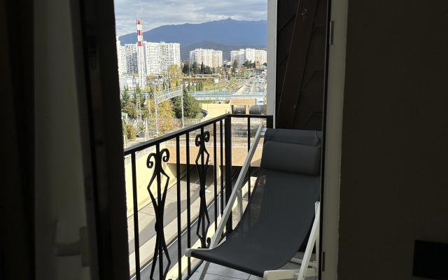 Апартаменты Двухуровневые апартаменты с балконом