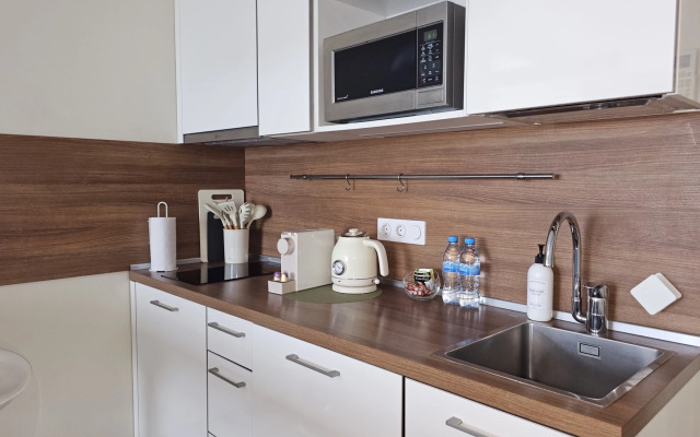 Апартаменты Стильная студия Riva на 12 этаже