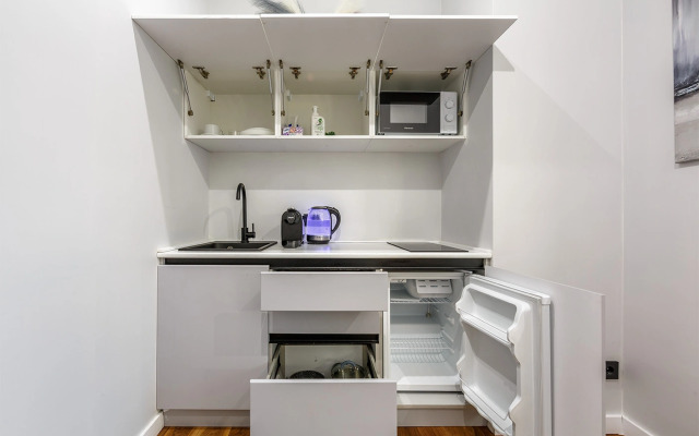 Апартаменты Комфортная студия на 35 этаже башни Оko