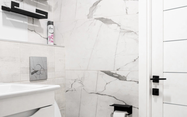 Uyutnaya s dizaneynerskim remontom v tsentre goroda Flat
