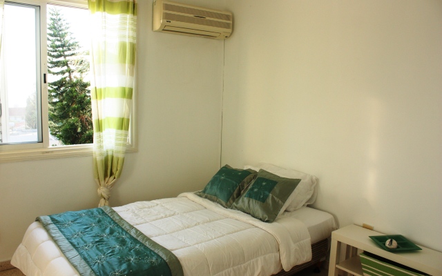 Green Oasis Beach Apartments