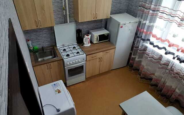 V Tsentre Goroda Apartments
