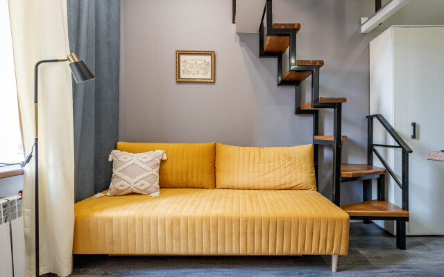 Апартаменты Уютная Двухуровневая Квартира Студия в Центре Города