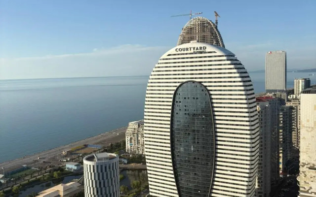 Апартаменты Orbi City