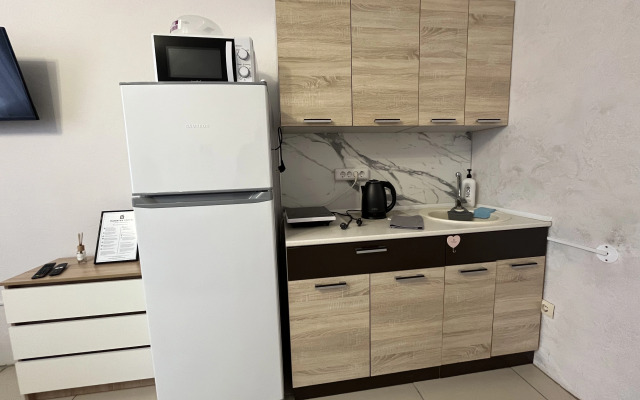 Апартаменты студия NHome Изумрудный город