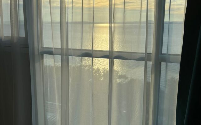 Idealnaya studiya s vidom na more Apartments