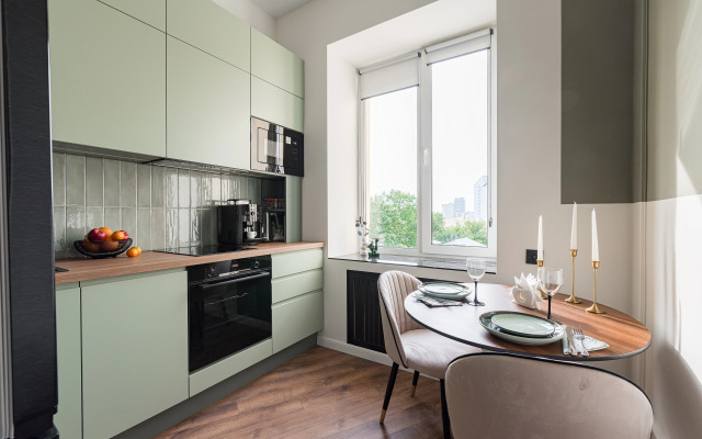 Апартаменты Сталинка после ремонта с видом на главный проспект Минска, крыши и закаты