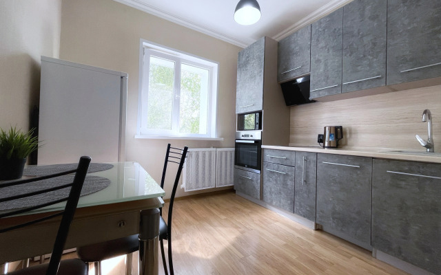 V Tsentre Goroda Apartments
