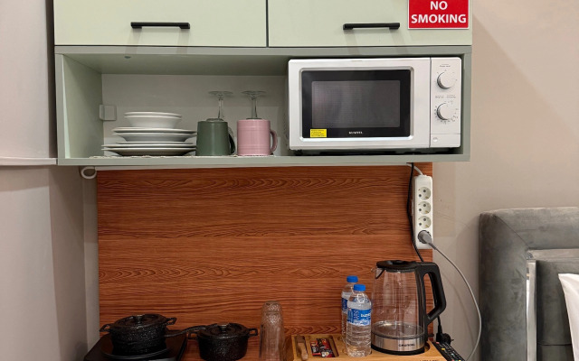 Апартаменты Cozy warm studio near the subway