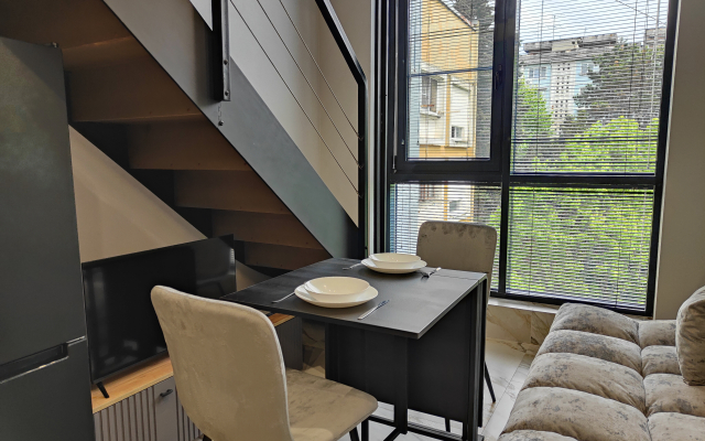 Апартаменты Дизайнерская двухуровневая студия