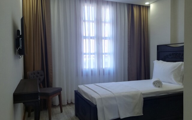 WOO Town Suites Hotel