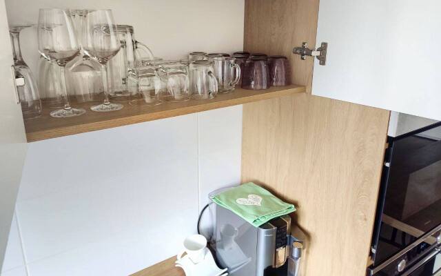 V Tsentre Goroda Flat