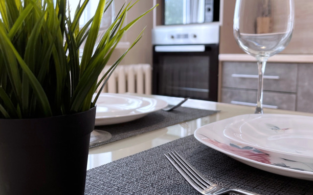 V Tsentre Goroda Apartments