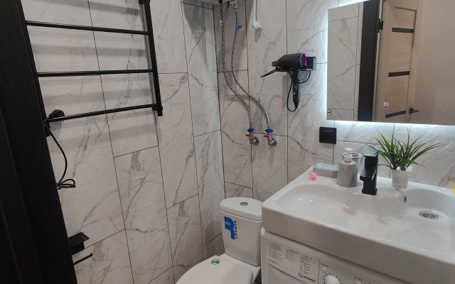 Апартаменты Уютная студия напротив университета и парка в центре Нефтяников