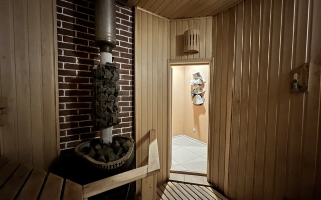 Designer with a sauna near the forest Kottedzh