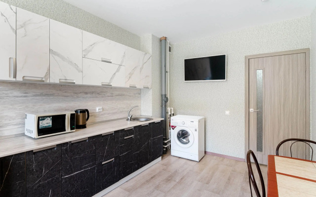 V Novom Dome Flat