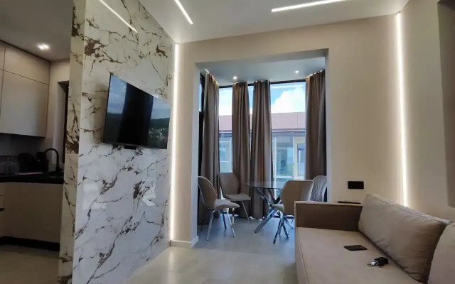 S Potryasayuschimi Vidami Apartments